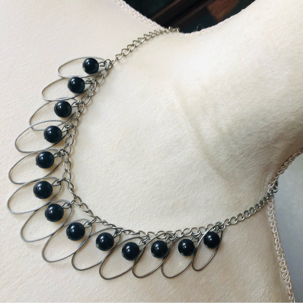 Oval matte silver tone disc simulated black pearl necklace